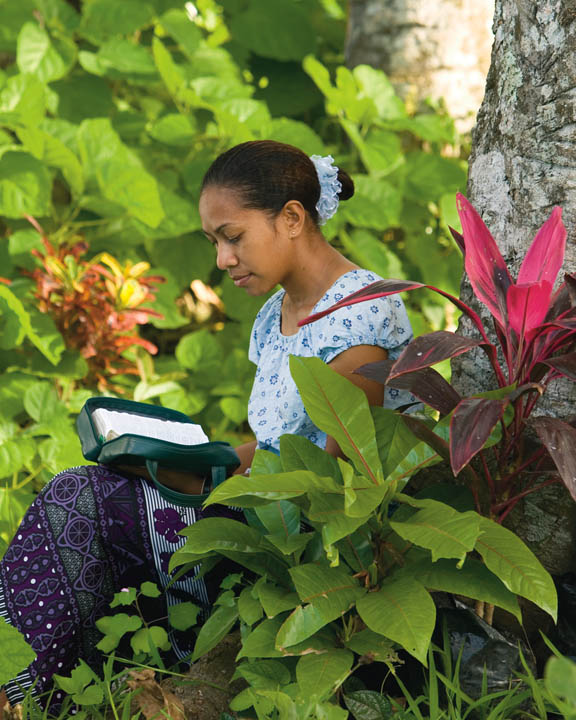 Mormon youth studying scriptures